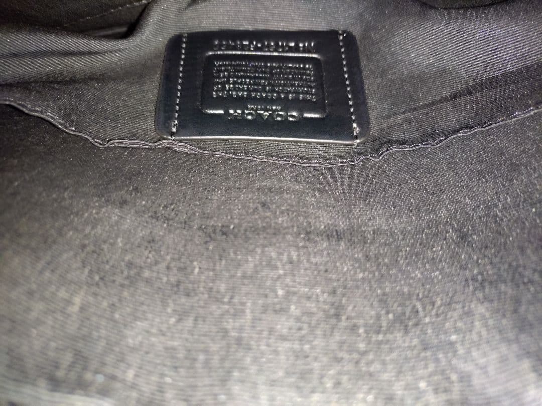 COACH シグネチャーレザー フライトバッグ