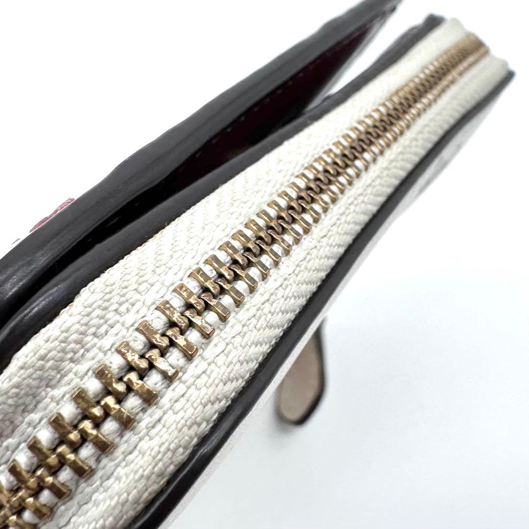 美品✨COACH コーチ 二つ折り財布 レザー てんとう虫 フローラル 日本限定