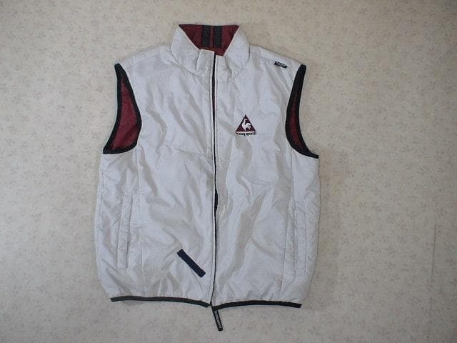 60951　ルコック　ゴルフ用リバーシブルベスト　白×ワインレッド　M