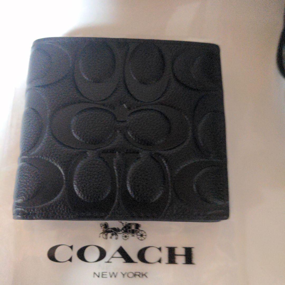 【新品未使用】COACH 二つ折り財布 黒 レザー