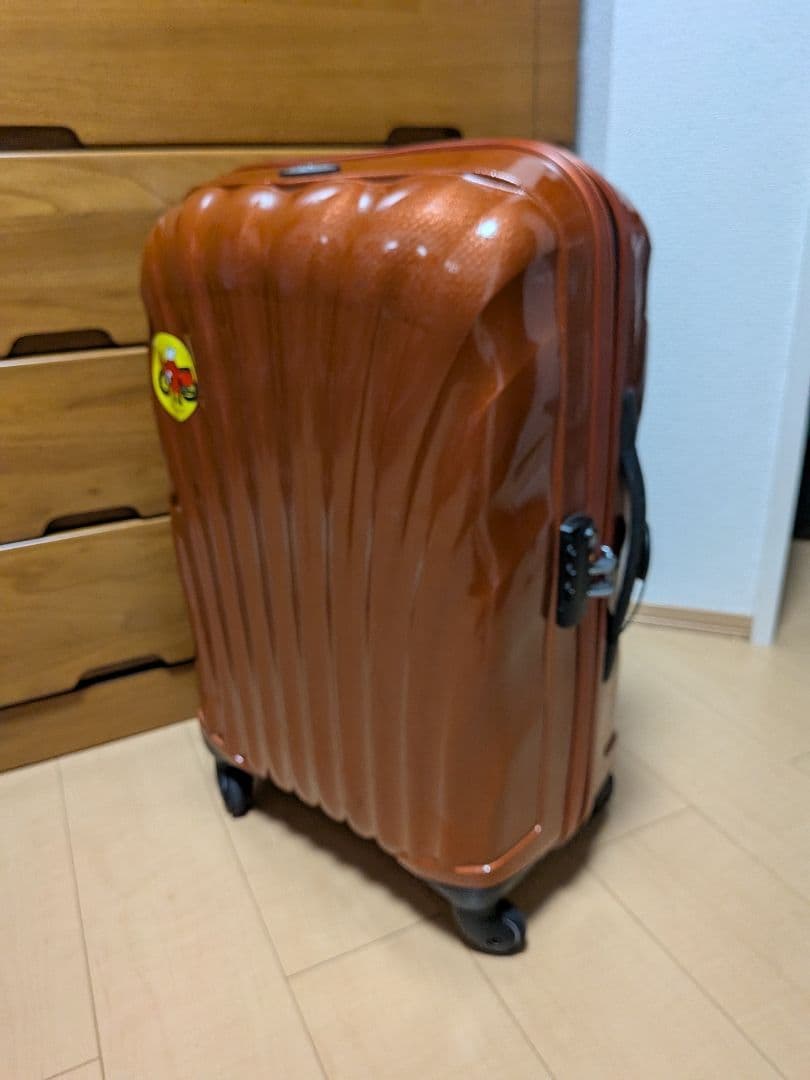 サムソナイト 波状テクスチャー キャリーケース コスモライト 4輪 オレンジ