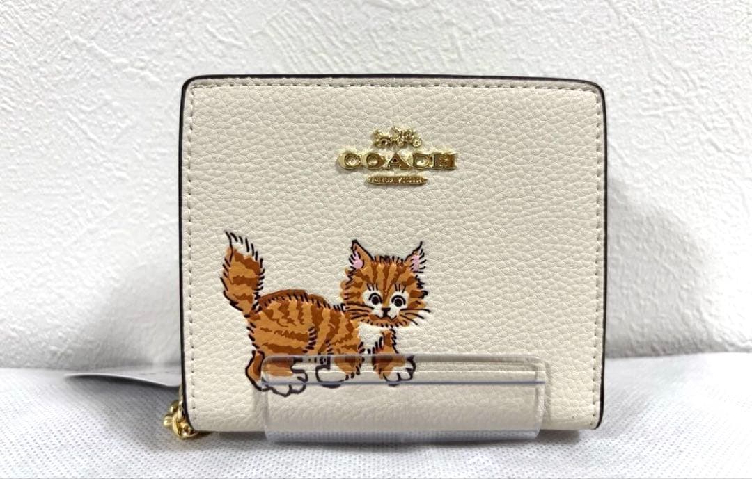 COACH 猫イラスト 二つ折り財布 ホワイト