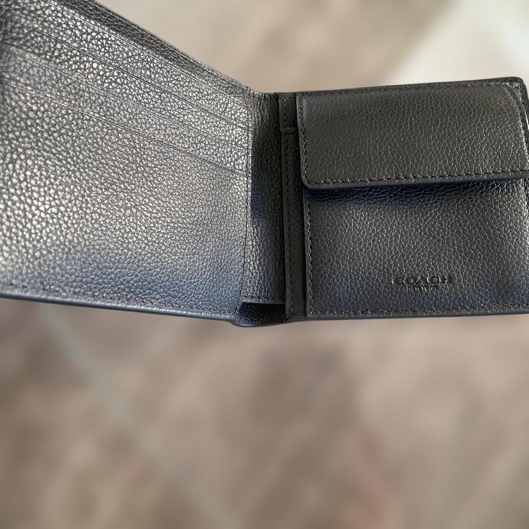 未使用　定価49,500円　COACH ブラック 二つ折り財布 ポケット付
