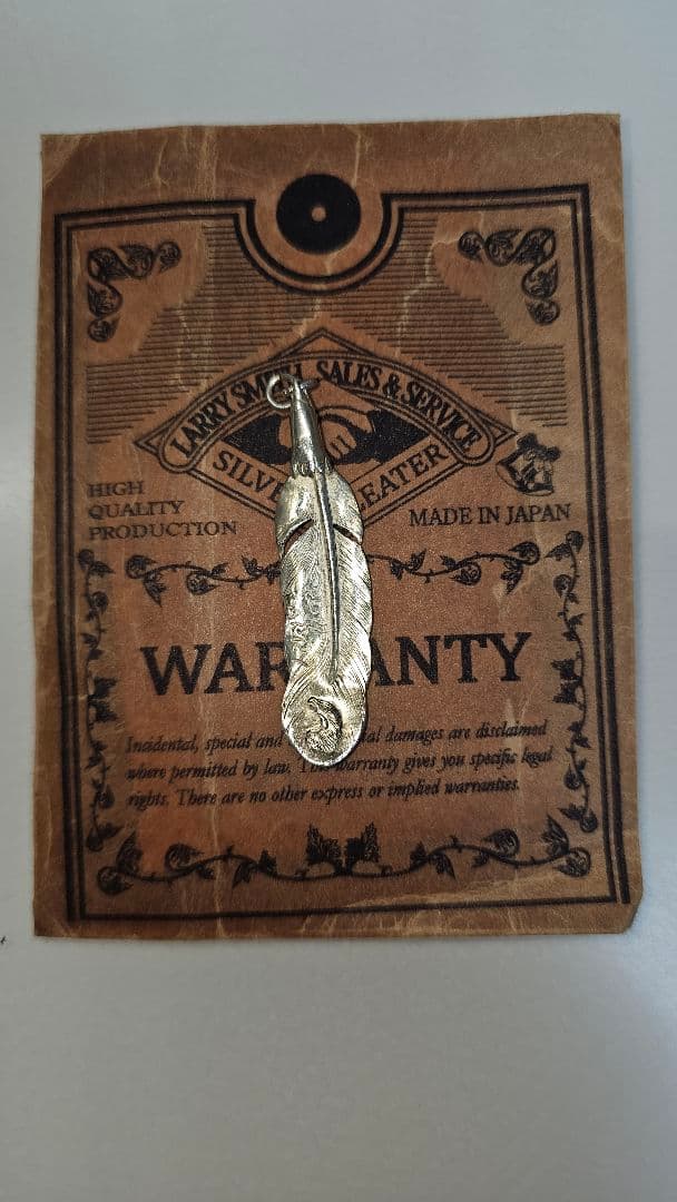 LARRY SMITHシルバー イーグルフェザー